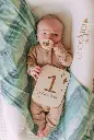 bamboo-ribbed-long-sleeve-henley-romper-earth-baby-outfitters-12_460x.webp
